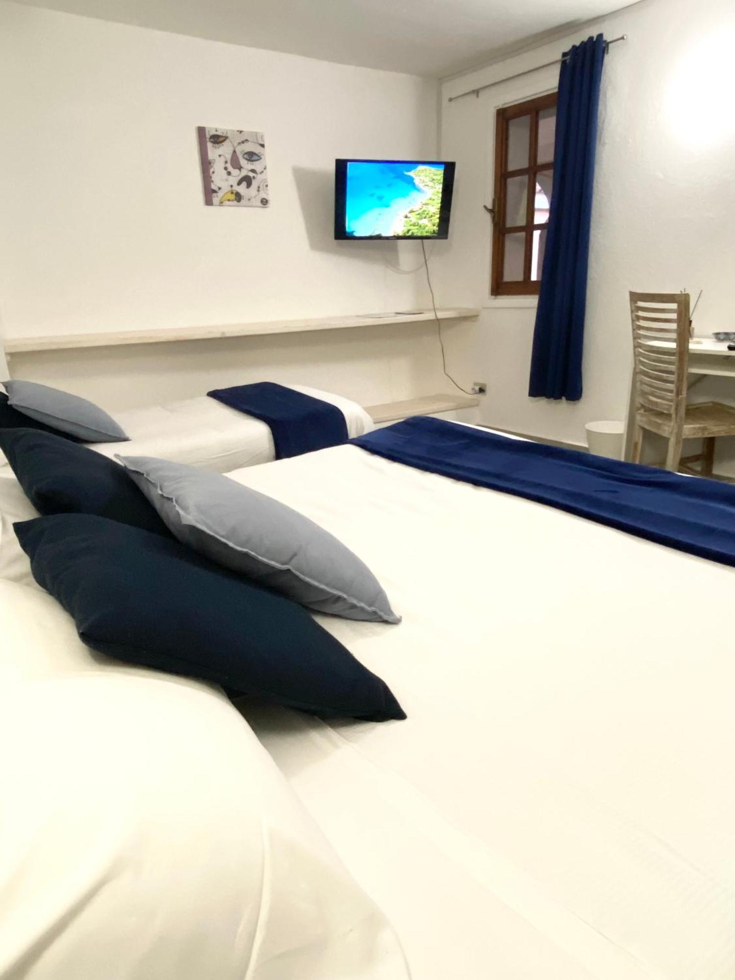 Cala Reale Rooms Marinella 马里内拉 外观 照片